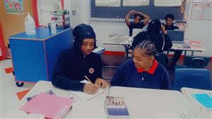 AJ working with 8th grade